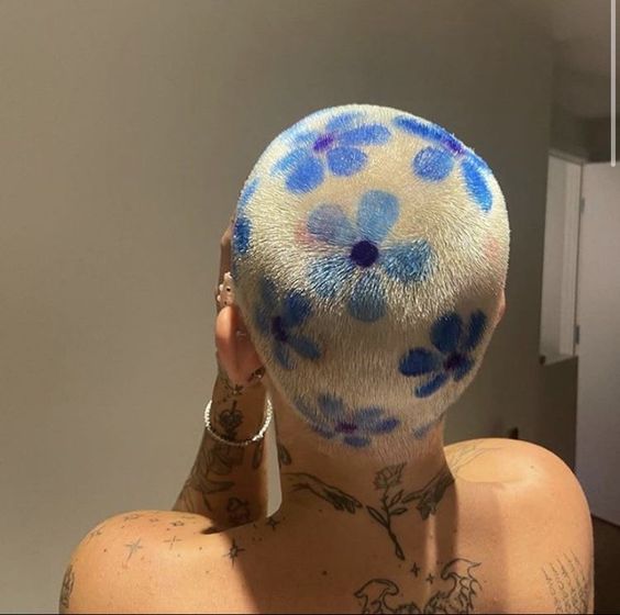 shaved head with designs